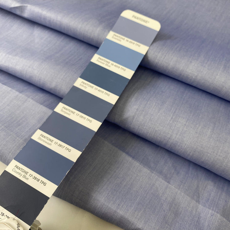 Pure cotton poplin in light blue color reference Eventide. Very soft and light, ideal for shirting, dresses and skirts. High-quality deadstock collected in Stock from a Maison de Couture in Italy.