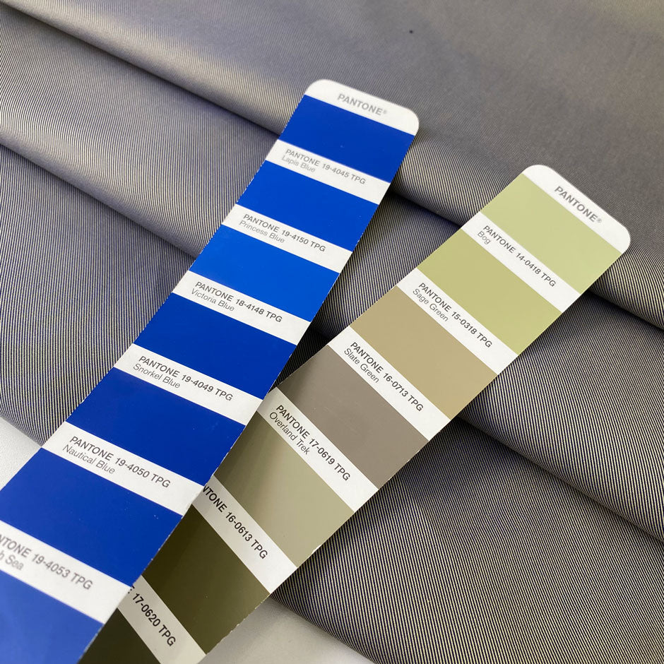 Mixed cotton and polyester denim with diagonal texture in a blend of sage green and bright blue. Medium weight, ideal for trench coats and jackets. High-quality deadstock collected in Stock from a Maison de Couture in Italy.