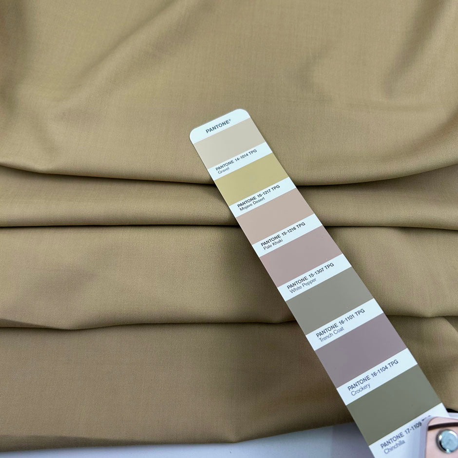 Beige stretch wool and very soft. Perfect for trousers. High-quality deadstock collected in Stock from a Maison de Couture in Italy.