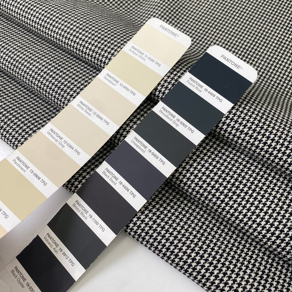 Pure wool with a pied de poule design in the shades of antique white and black sand. Stiff and rough, ideal for coats, jackets, and structured skirts. High-quality deadstock collected in Stock from a Maison de Couture in Italy.