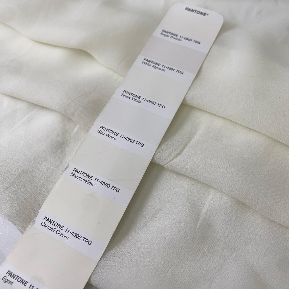 Pure viscose chiffon in white, color reference Marshmallow. Very soft and light, transparent and flowy. Ideal for dresses, skirts, blouses, and shirting. High-quality deadstock collected in Stock from a Maison de Couture in Italy.