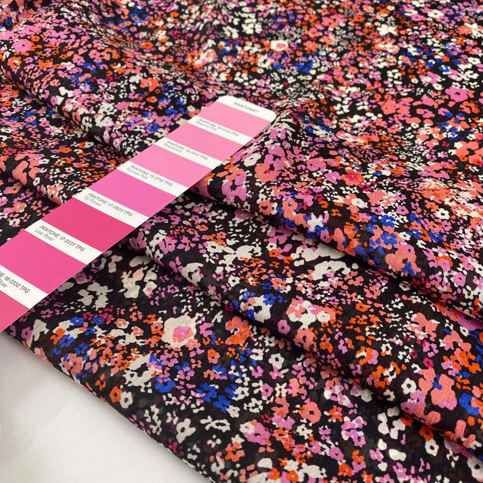 Pure silk chiffon soft and falling. The ground i black and the design is floral and multicolor. High-quality deadstock fabric collected in Stock from a Maison de Couture in Italy.
