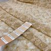 Polyester lace in floral design stretch, very soft and light. Skin ground color with some gold lurex. High-quality deadstock fabric collected in Stock from a Maison de Couture in Italy.