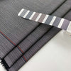 Gray and white stretch wool pinstripes. High quality deadstock fabric.