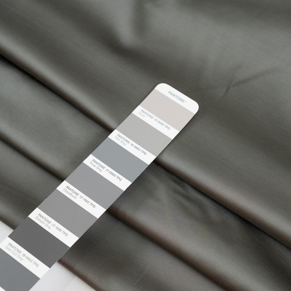 Mixed viscose and wool in gray shades. Stretch and soft. High-quality deadstock fabric by the meter collected in Stock from a Maison de Couture in Italy