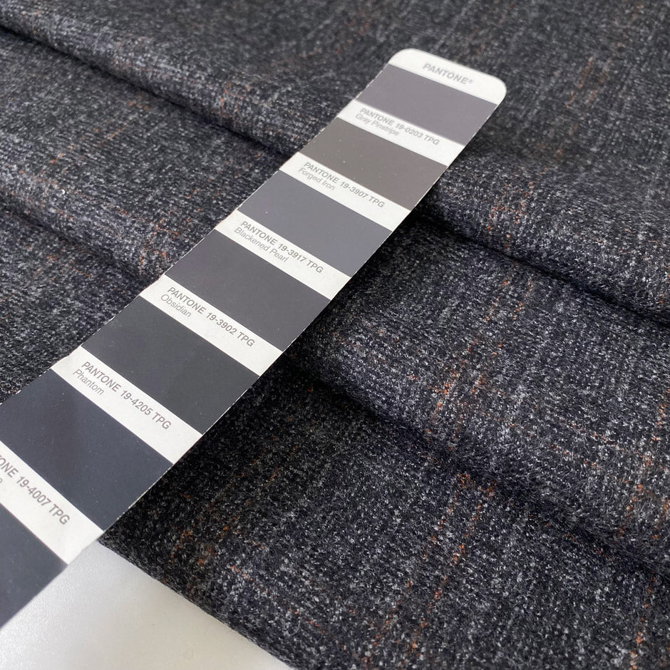 Soft and warm pure wool flannel in dark gray with a subtle orange stripe. Ideal for jackets, trousers, and skirts.
High-quality deadstock collected in Stock from a Maison de Couture in Italy.