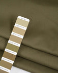 Stretched and structured plain green cotton gabardine - High quality deadstock