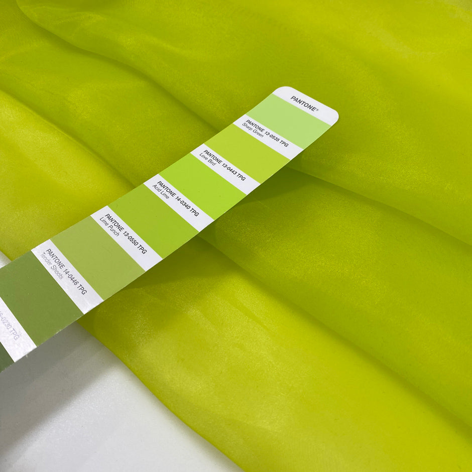 Green, acid lime, polyester organza soft and light. High-quality deadstock fabric collected in Stock from a Maison de Couture in Italy.