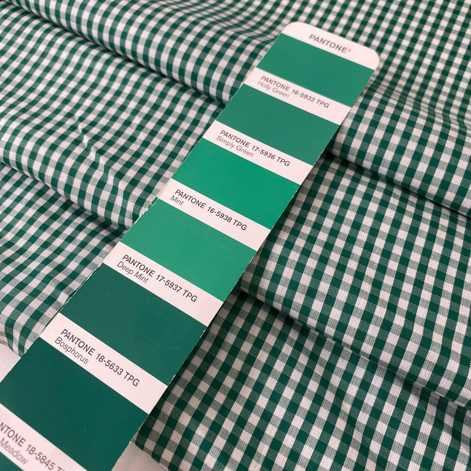 Pure cotton poplin with a small check design in shades of white and green. Very soft and light. Ieal for dresses, shirting, and skirts. High-quality deadstock collected in Stock from a Maison de Couture in Italy.