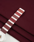 Punto Milano jersey of viscose and poliammide. The fabric is heavy, Stretch and bordeaux. High-quality deadstock collected in Stock from a Maison de Couture in Italy.