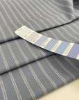 Blue pinstripe pure wool. High-quality deadstock fabric collected in Stock from a Maison de Couture in Italy.