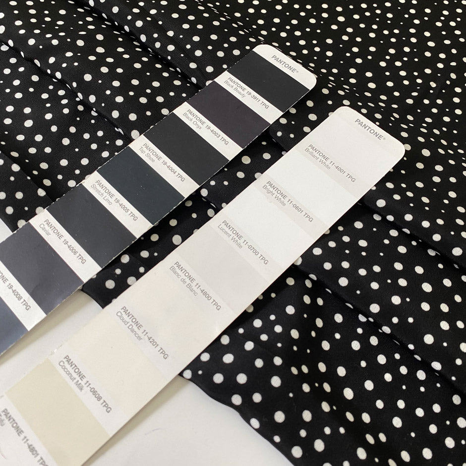 Pure silk crêpe de chine, very soft and light, with a black and white polka dot print. Not transparent and very flowy. Ideal for shirting, dresses, and skirts. High-quality deadstock collected in Stock from a Maison de Couture in Italy.