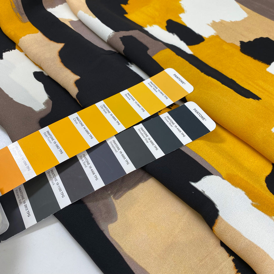 Pure viscose printed with beautiful abstract design. In ochre, white, beige, and black shades. High-quality deadstock fabric by the meter collected in Stock from a Maison de Couture in Italy.