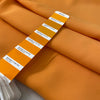 Medium-weight polyester cady in Iceland orange. Puffy, very soft and flowy, not transparent. Ideal for trousers, skirts, dresses, and heavy blouses. High-quality deadstock collected in Stock from a Maison de Couture in Italy.
