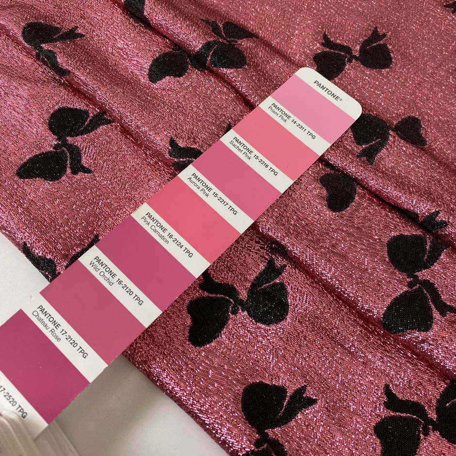 Silk and lurex fabric in pink with black bow print. Very soft and light, flowy and sparkling, not transparent. Ideal for dresses, skirts, blouses, and shirting. High-quality deadstock collected in Stock from a Maison de Couture in Italy.