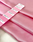 Pure silk twill in baby pink is very soft, light, and shiny. High-quality deadstock fabric collected in Stock from a Maison de Couture in Italy.