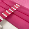 Very light micro tulle and stretchy in fuchsia. Light and transparent, with a very soft and flowy texture. High-quality deadstock fabric by the meter collected in Stock from a Maison de Couture in Italy.