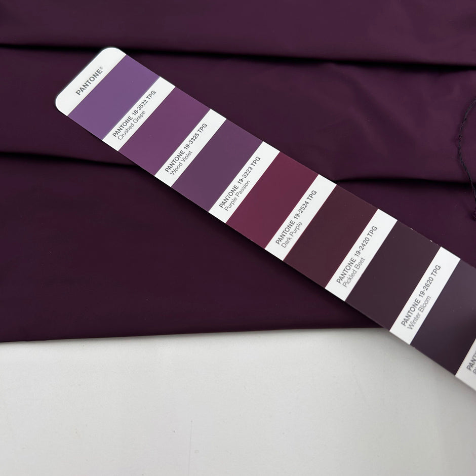 Purple waterproof polyester taffeta, rigid and non-stretch. Perfect for trench. High-quality deadstock collected in Stock from a Maison de Couture in Italy.