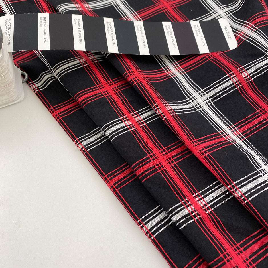 Yarn-dyed cotton and viscose jacquard with geometric design. High quality deadstock fabric.