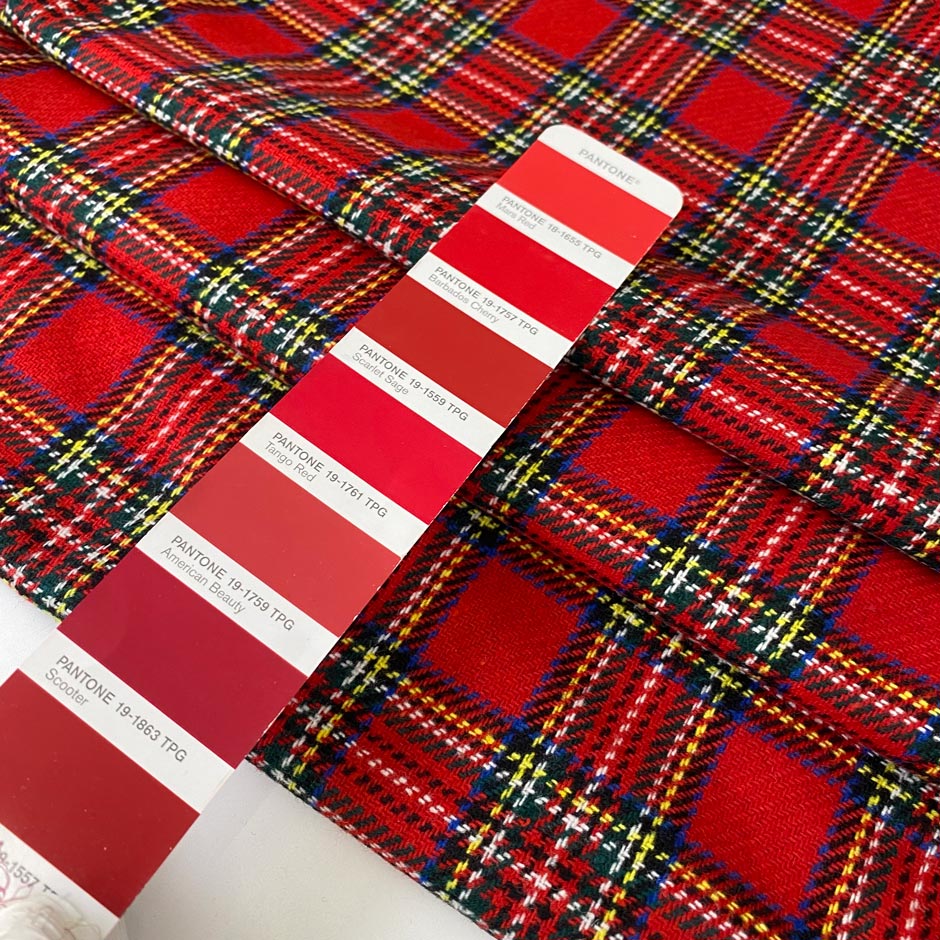 Tartan fabric in a soft wool and polyester blend with a classic Scottish design in shades of red, blue, white, and green. Very soft and warm, ideal for dresses, skirts, and light jackets. High-quality deadstock collected in Stock from a Maison de Couture in Italy.