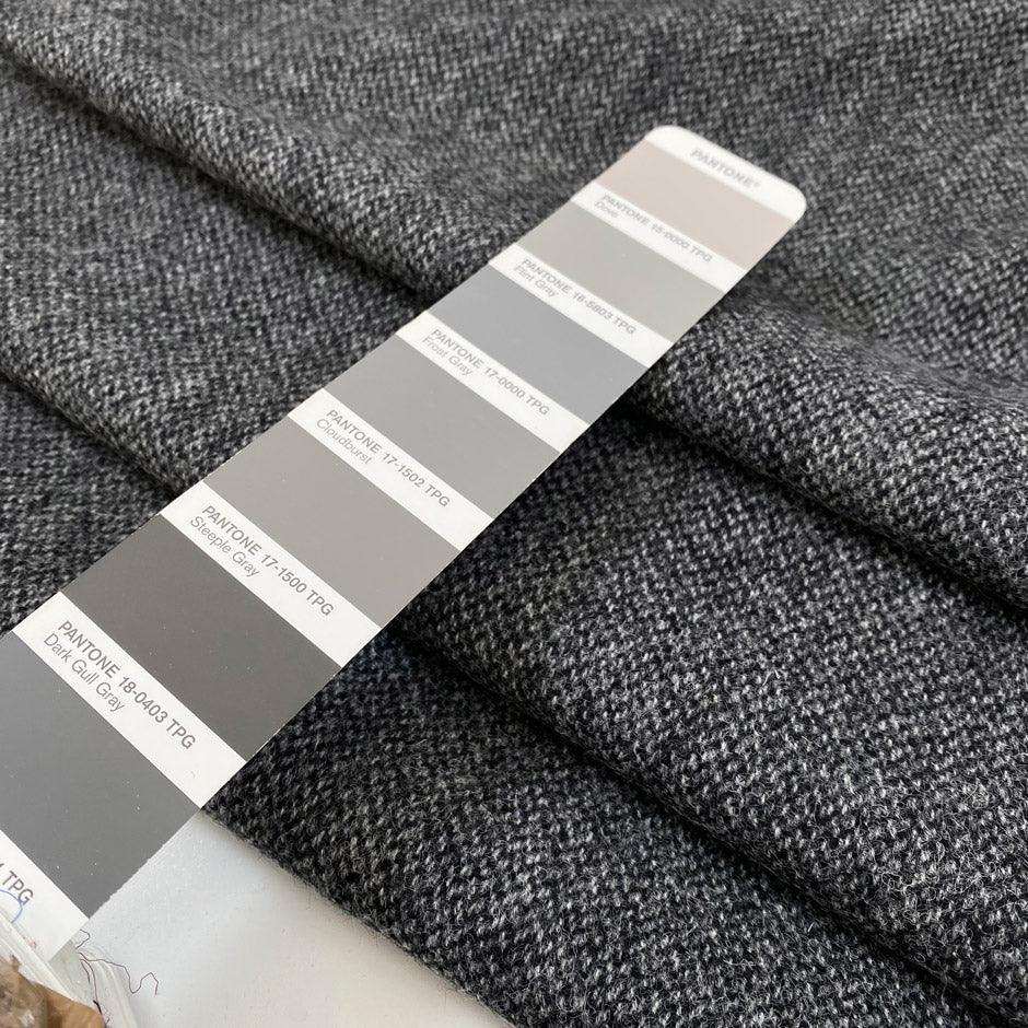 Pure wool tweed in gray melange, very soft and warm, medium weight. High-quality deadstock fabric by the meter collected in Stock from a Maison de Couture in Italy.