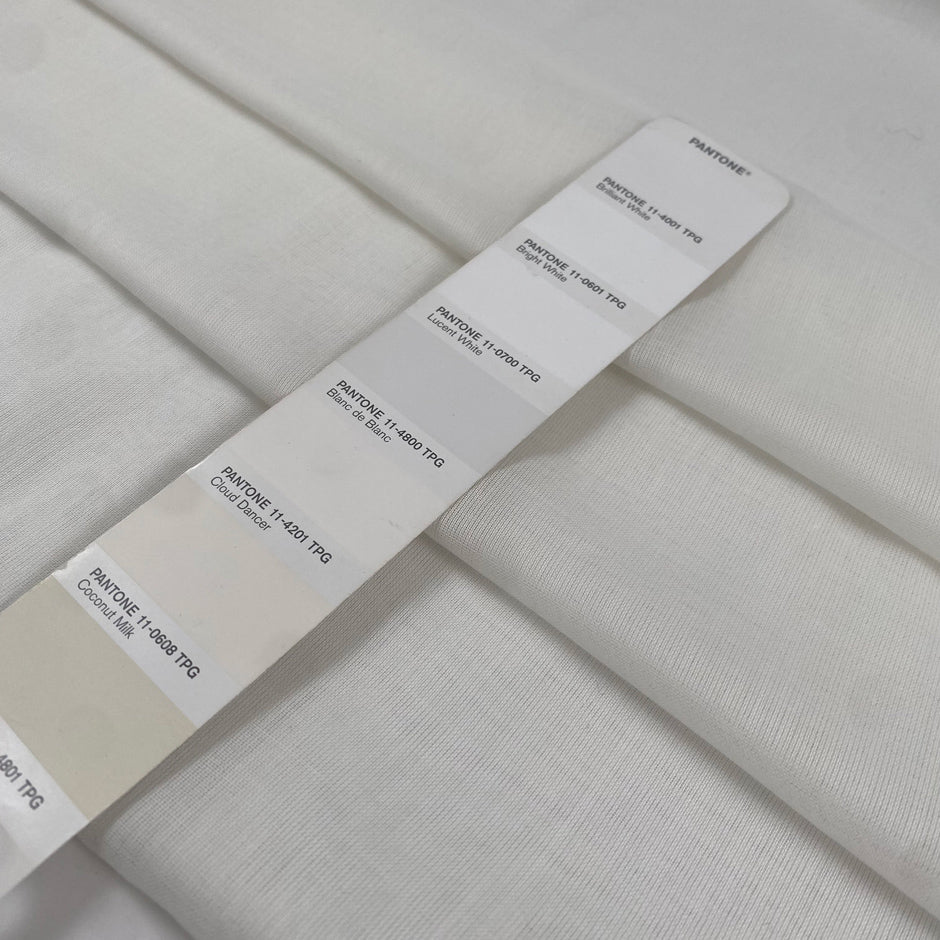 Pure cotton gauze in coconut milk white, very soft, light, and transparent. Flowy and breathable, ideal for dresses, shirting, and blouses. High-quality deadstock collected in Stock from a Maison de Couture in Italy.