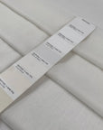 Pure cotton gauze in coconut milk white, very soft, light, and transparent. Flowy and breathable, ideal for dresses, shirting, and blouses. High-quality deadstock collected in Stock from a Maison de Couture in Italy.