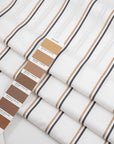 Shadow striped white cotton polin with black and beige stripes. High quality deadstock fabric.