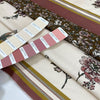 Cotton and elastane with beautiful floral design in panels. Each one is around 70 cm. White, ancient rows and olives green shades.