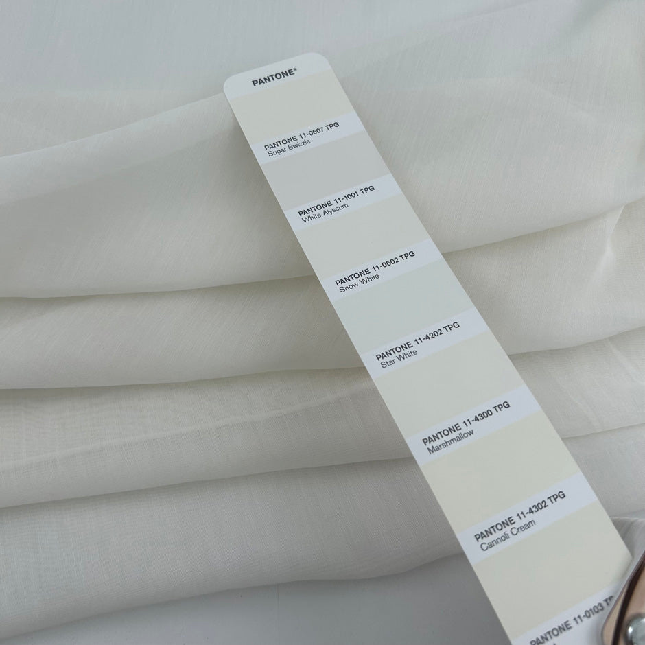 White silk and cotton voile, soft, transparent and non-stretch. High-quality deadstock collected in Stock from a Maison de Couture in Italy.