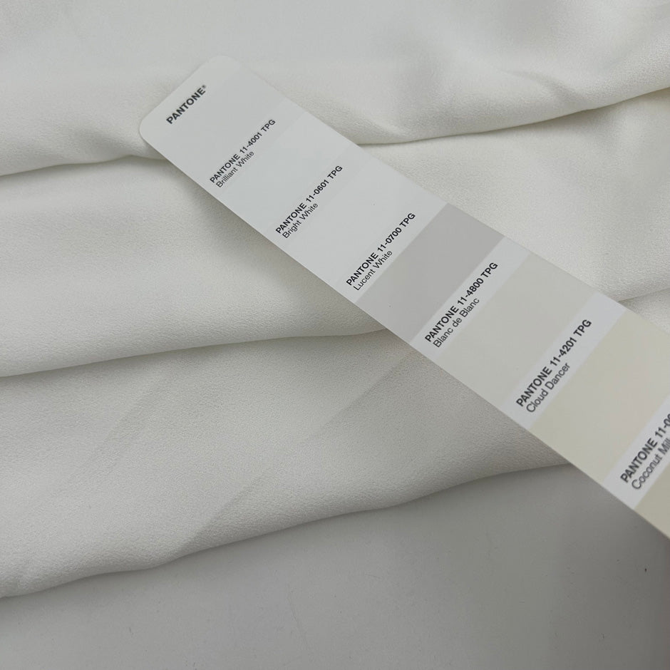 White viscose crepe sable not transparent and not stretch. High-quality deadstock collected in Stock from a Maison de Couture in Italy.