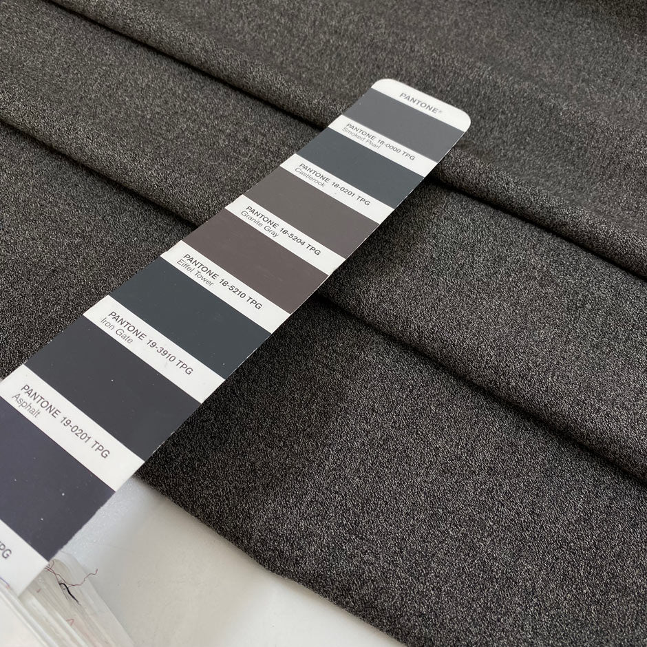 Blended wool and polyester in light gray melange. Very soft and lightweight, not transparent. Ideal for dresses, light jackets, skirts, and trousers. High-quality deadstock collected in Stock from a Maison de Couture in Italy.