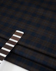 Lightweight blue and brown checked flannel pure virgin wool. High-quality deadstock fabric collected in Stock from a Maison de Couture in Italy.