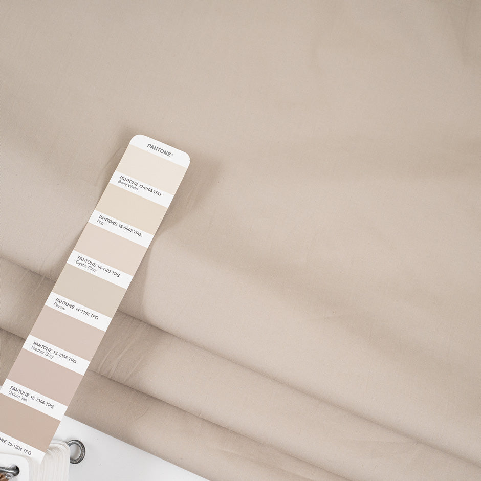 Stretch beige cotton stiff fabric. High-quality deadstock fabric collected in Stock from a Maison de Couture in Italy.