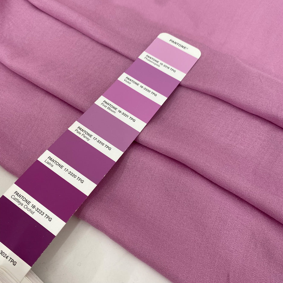 Soft and lightweight pure viscose muslin in pink, color reference Phalaenopsis. Flowy and breathable, ideal for light shirting, dresses, and skirts.High-quality deadstock collected in Stock from a Maison de Couture in Italy.