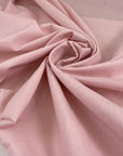 Pure cotton popline in baby pink color, very soft and light. High-quality deadstock fabric collected in Stock from a Maison de Couture in Italy.