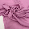 Soft and lightweight pure viscose muslin in pink, color reference Phalaenopsis. Flowy and breathable, ideal for light shirting, dresses, and skirts.High-quality deadstock collected in Stock from a Maison de Couture in Italy.