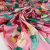 Pink polyester satin with floral printing. High-quality deadstock collected in Stock from a Maison de Couture in Italy.