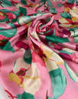 Pink polyester satin with floral printing. High-quality deadstock collected in Stock from a Maison de Couture in Italy.