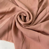 Soft and lightweight pink pure silk georgette. Faintly textured, flowy, and not transparent. Ideal for dresses, skirts, blouses, and shirting.High-quality deadstock collected in Stock from a Maison de Couture in Italy.