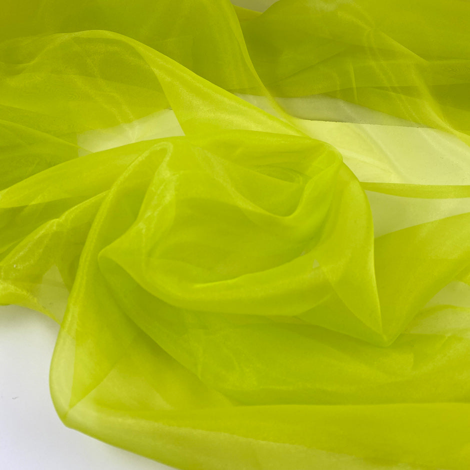 Green, acid lime, polyester organza soft and light. High-quality deadstock fabric collected in Stock from a Maison de Couture in Italy.