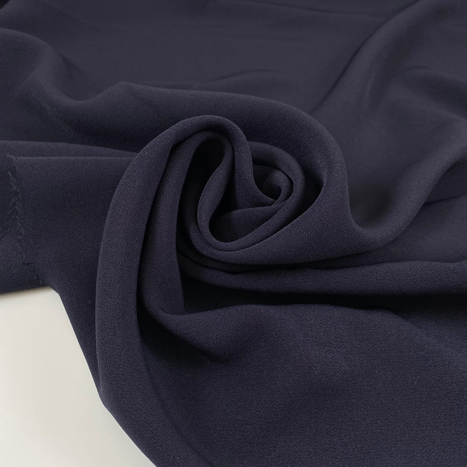 Heavy cady in cotton and polyester with elastane in double blue, very soft and flowy. High-quality deadstock fabric by the meter collected in Stock from a Maison de Couture in Italy.