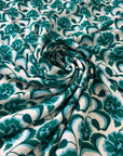 Printed Polyester With A Green And Blue Flower Design
