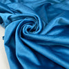 Viscose and polyester velvet in light blue, heavy and structured, very shiny. High-quality deadstock fabric collected in Stock from a Maison de Couture in Italy.