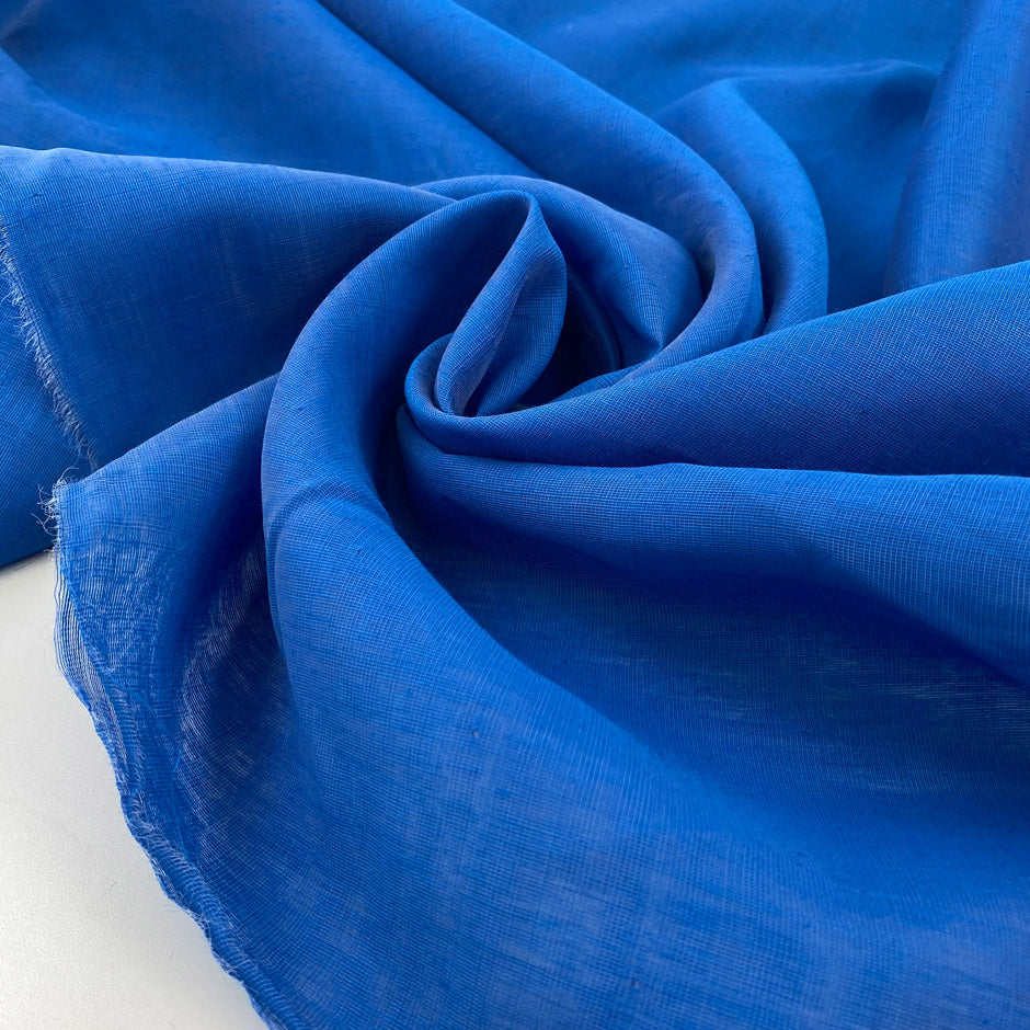 Light and soft linen and polyester organza in bright blue doubled. High-quality deadstock fabric collected in Stock from a Maison de Couture in Italy.