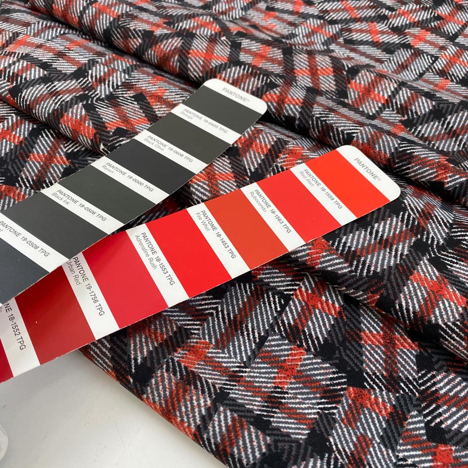 Stretch polyester cady with a geometrical design in white, red, black and gray shades shades. Very soft and flowy, not transparent. High-quality deadstock fabric collected in Stock from a Maison de Couture in Italy.