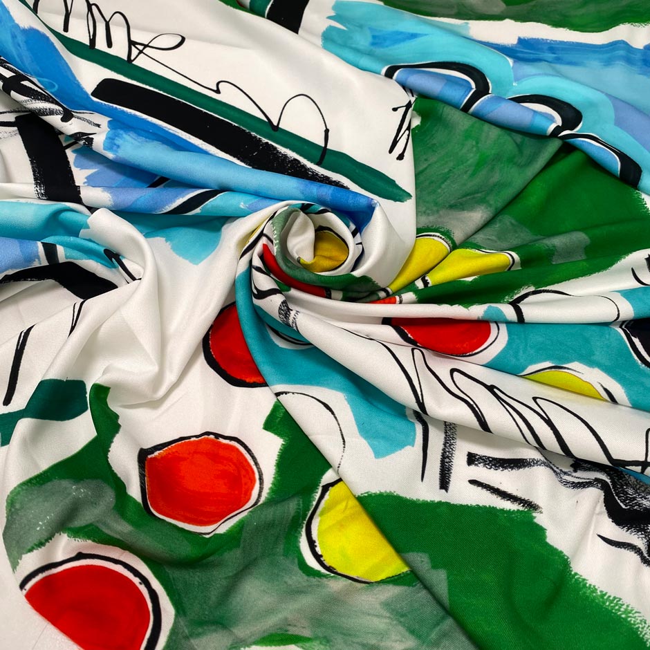 Light and soft polyester twill with a white base and large multicolor print in shades of red, yellow, black, green, and light blue. Ideal for dresses, skirts, blouses, and shirting.&nbsp;High-quality deadstock collected in Stock from a Maison de Couture in Italy.