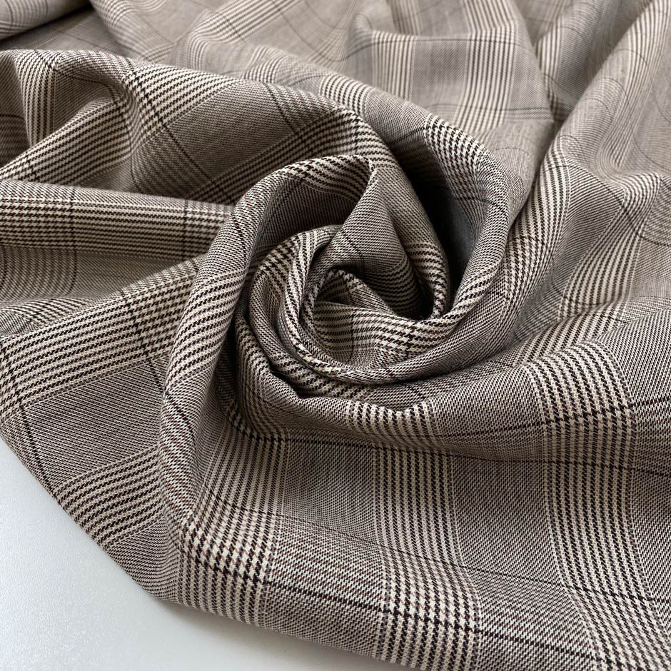 Pure wool with prince of wales design in beige and brown design. High-quality deadstock fabric by the meter collected in Stock from a Maison de Couture in Italy.