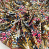 Multicolor polyester twill with beautiful floral design. In dark blue background and red, green, pink, light blue and white shades. Very light high-quality deadstock fabric by the meter collected in Stock from a Maison de Couture in Italy.