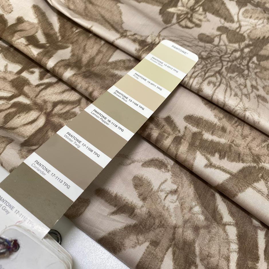 Stiff viscose and polyester taffeta printed with a jungle leaf design in sand and beige shades. Adds volume and holds shape, ideal for skirts, trench coats, and dresses.&nbsp;High-quality deadstock collected in Stock from a Maison de Couture in Italy.